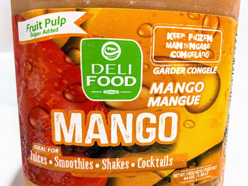 Mango 64oz plastic bottle of sweetened juice