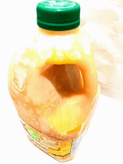 Mango 64oz plastic bottle of sweetened juice